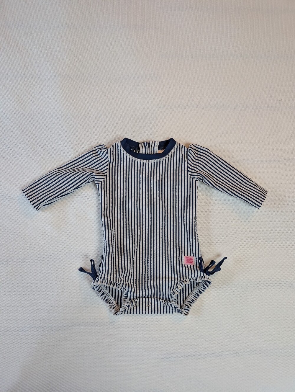 RuffleButts Navy Striped Long Sleeve One Piece Swimsuit Rash Guard